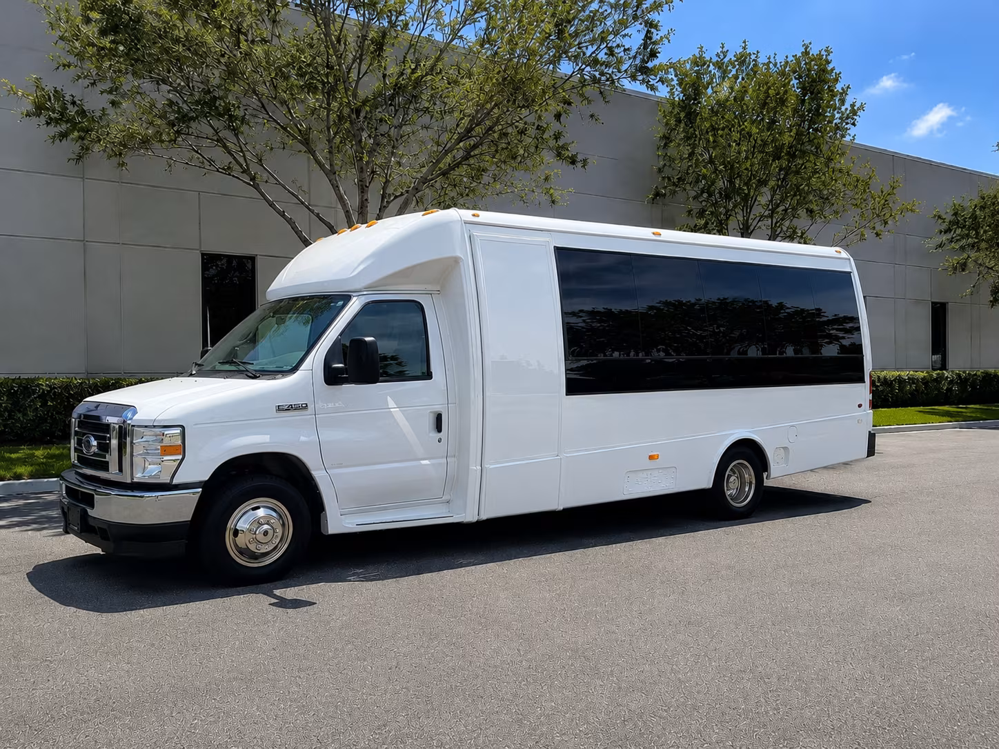 corporate airport transfer buses between brockton and boston logan